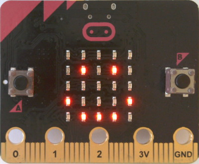 Hands connecting wires to a board